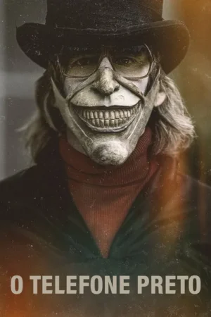 Um homem de cartola e óculos, com olhos visíveis e máscara branca de sorriso medonho. Cabelo comprido, fundo sombrio.