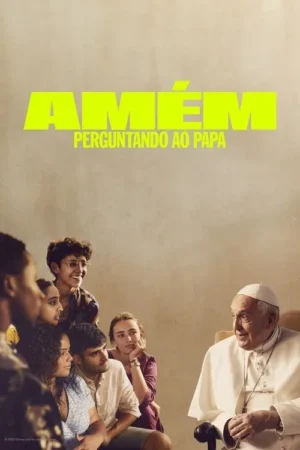Papa Francisco sorri, sentado, olhando para um grupo de jovens atentos e diversos à esquerda. Clima de conversa íntima.
