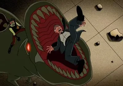 Homem aterrorizado é engolido por monstro verde gigante. Uma pequena figura mascarada em traje com óculos monta o monstro.