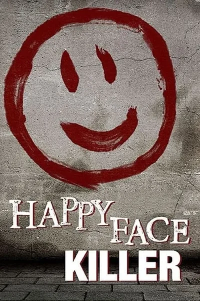 Um smiley vermelho grosseiro, grafiteado em uma parede de concreto cinza e rachada. O chão escuro contribui para o clima sombrio.