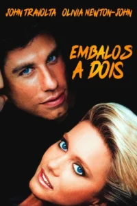 Pôster com um homem e uma mulher de olhos azuis brilhantes. Ele acima,ela abaixo e inclinada,olhando intensamente. Fundo escuro,clima de romance.