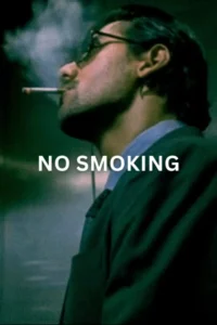 Homem de óculos em perfil fumando um cigarro,com fumaça visível. Veste camisa e paletó escuros. Fundo sombrio. Texto:NO SMOKING.