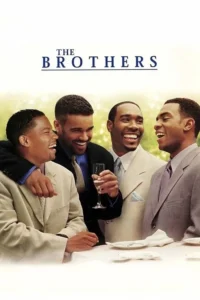 Quatro homens negros,vestindo ternos,riem animadamente em uma confraternização ao ar livre. Clima alegre e de amizade.