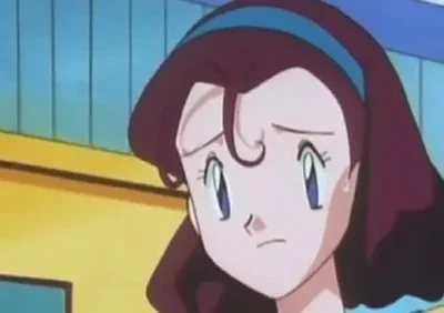 Garota anime com cabelo castanho e faixa azul, expressando tristeza ou preocupação, com uma gota de suor na bochecha. Fundo desfocado em amarelo e azul.