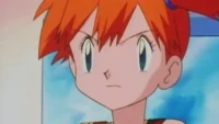 Personagem anime feminina de cabelo laranja em coques, olhando fixamente com testa franzida. Fundo azul suave.