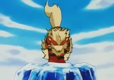 Criatura vermelha e dourada com chama na cabeça, presa em um bloco de gelo azul sob céu claro e nuvens.