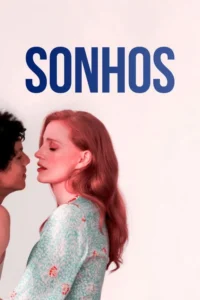 Duas pessoas,uma mulher ruiva e um homem de cabelo escuro,com os rostos muito próximos em um fundo branco simples. Clima íntimo e sonhador.