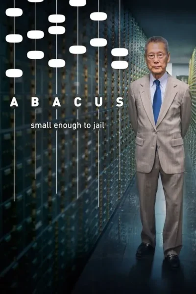 Homem idoso de terno e gravata azul em um cofre escuro. Contas de ábaco formam ABACUS e small enough to jail.