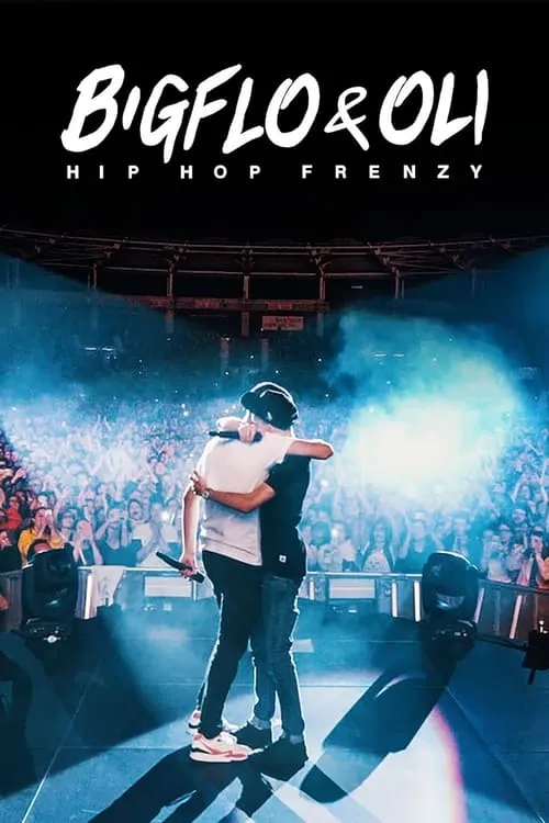 Bigflo &Oli:Hip Hop Frenzy 1 Dois músicos se abraçam no palco,de costas para a plateia. O fundo mostra uma multidão vibrante e luzes azuis e fumaça de show.