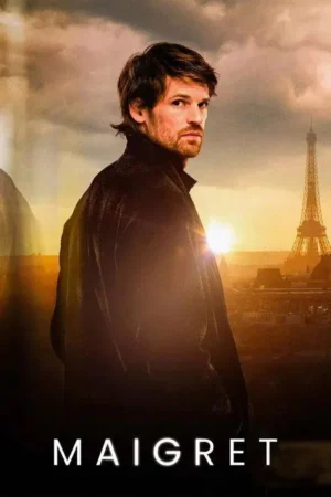 Homem barbudo de casaco escuro olha para o espectador. A Torre Eiffel e Paris ao pôr do sol criam um cenário dramático.