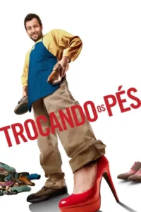 Homem sorridente em avental azul,segurando sapatos. Um pé usa tênis,o outro um salto vermelho vibrante. Pilha de calçados ao lado. Clima cômico.