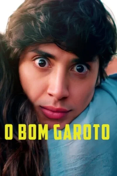 Rosto de um jovem com cabelo escuro, olhos arregalados e um leve sorriso. Parte do cabelo de outra pessoa aparece à esquerda.