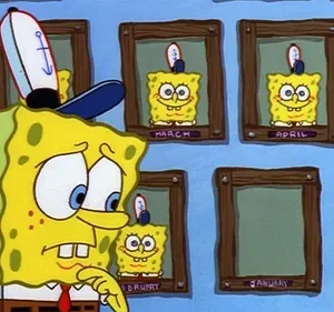 Grande esponja amarela pensativa morde o dedo, olhando para quadros em uma parede azul com versões felizes de si e um quadro de mês vazio.