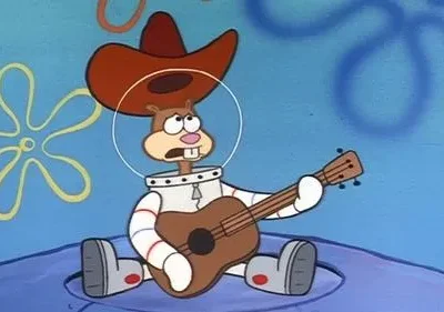 Esquilo cartunizado com chapéu de caubói e roupa de astronauta toca violão, parecendo angustiado. Fundo azul subaquático.