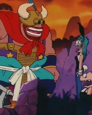 Homem gigante de capacete com chifres e machado ri. Mulher de coelhinha e criatura pequena parecem apavorados. Cenário rochoso e céu laranja.