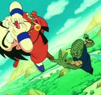 Garoto de vermelho de ponta-cabeça e rindo, confronta alien verde de garras. Fundo de montanhas e céu.