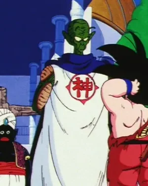 Três figuras de anime: um alienígena verde alto de capa, um ser de pele escura com turbante e um jovem de rabo coçando a cabeça. Cenário claro.