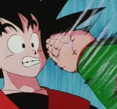 Um jovem personagem de anime com cabelo espetado recebe um soco no rosto, com expressão de choque e linhas de impacto.