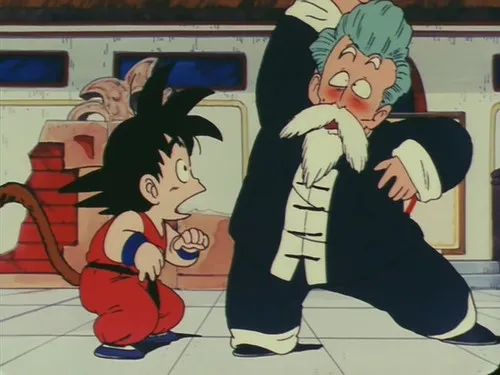Dragon Ball – T01E26:A Força do Kamehameha 1 Um menino de gi vermelho com cauda observa chocado um mestre idoso de barba e cabelo azul,que faz uma pose de luta corada e desajeitada.