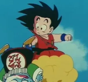 Jovem de cabelo espetado e roupa laranja voa numa nuvem amarela, com criatura de chapéu verde abaixo. Céu azul, cena de aventura.