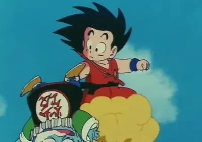 Jovem de cabelo espetado e roupa laranja voa numa nuvem amarela, com criatura de chapéu verde abaixo. Céu azul, cena de aventura.