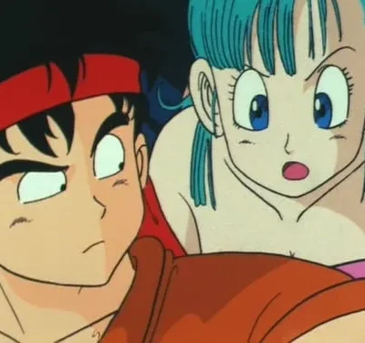 Um jovem de bandana vermelha olha intrigado enquanto uma mulher de cabelo azul parece chocada em cena de anime.