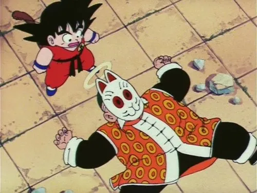 Dragon Ball – T01E75:Como um Adversário se Tornou um Velho Amigo? 1 Garoto de cabelo espetado e gi vermelho olha chocado para homem gordo com máscara de gato e auréola,caído no chão de azulejos.