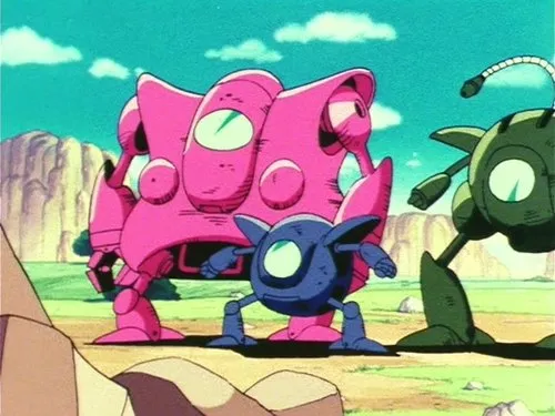 Dragon Ball – T01E77:O Grande Plano de Pilaf 1 Imagem animada de três robôs:um rosa gigante,um azul pequeno e um verde. Num campo rochoso com montanhas e céu azul.