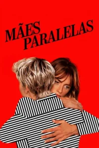Fundo vermelho. Duas mulheres abraçadas:uma de costas,cabelo loiro,listrada;a outra,cabelo castanho,com olhar intenso.