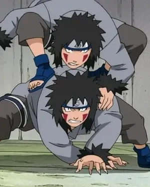 Dois personagens de anime com cabelo espetado e marcas faciais. Um sobre o outro, agachados em pose de combate, expressão intensa.