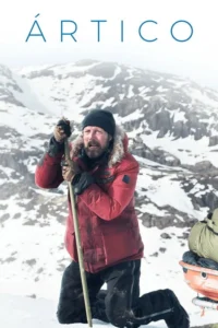Homem barbudo ajoelhado na neve,de casaco vermelho e gorro,com expressão de angústia. Ambiente ártico desolador e montanhoso.