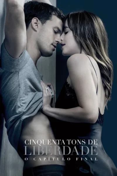 Homem e mulher em abraço íntimo. Ele de camiseta cinza, ela de vestido preto, rostos próximos, quase se beijando. Mão dela na cintura dele. Clima sensual.