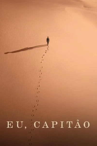 Um homem caminha sozinho sobre dunas de areia texturizadas ao entardecer. Suas pegadas e uma longa sombra pontuam o vasto deserto.