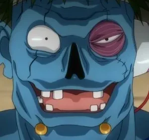 Rosto de criatura azul, costurado, com cabelo verde e dentes espaçados. Tem um olho roxo inchado, outro arregalado e uma orelha-foguete. Expressão maníaca.