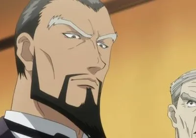 Dois homens de anime: um com barba preta e sobrancelhas brancas tem olhar sério. Ao lado, um homem mais velho parece surpreso.