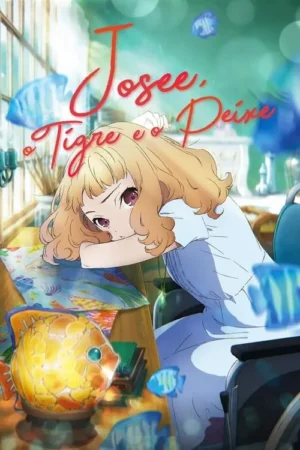 Jovem loira em cadeira de rodas, apoiada em mesa com arte de peixes coloridos. Peixes azuis flutuam, criando clima onírico e criativo.