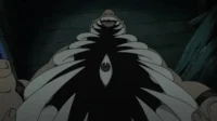 Fullmetal Alchemist:Brotherhood – T01E24:Dentro do Estômago 9 De Fullmetal Alchemist,um monstro musculoso e sorridente. Um olho vertical se destaca de uma massa peitoral escura com pontas afiadas. Fundo escuro.
