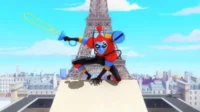 Personagem vermelho e azul, estilo robô, agachado em telhado de Paris. Segura uma espada de bolhas, com Torre Eiffel ao fundo.