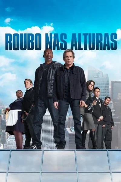 Sete pessoas, dois homens proeminentes, posam no topo de um arranha-céu. Cidade ao fundo. Clima de assalto ou missão.